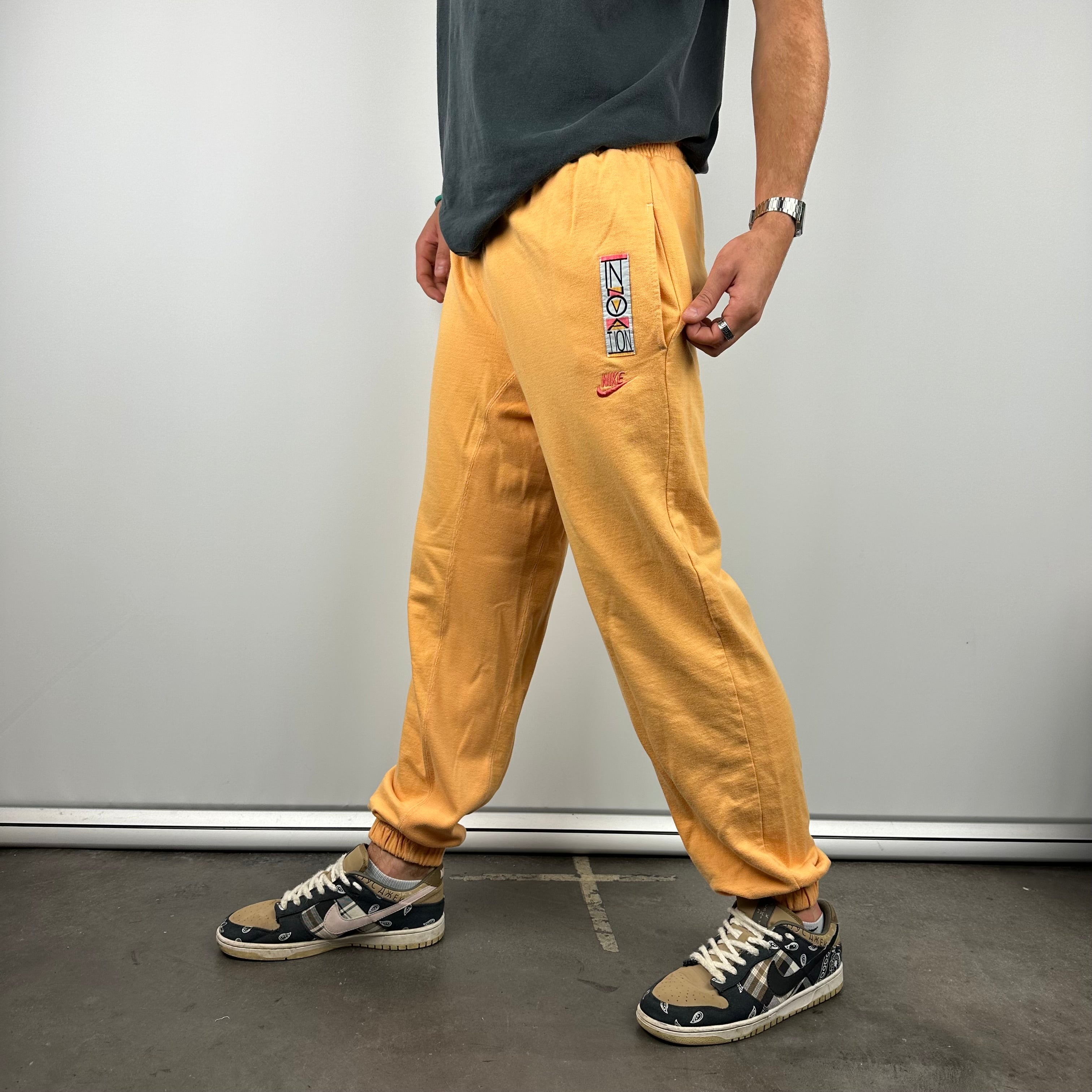 Nike Peach Embroidered Spell Out Track Pants (M)