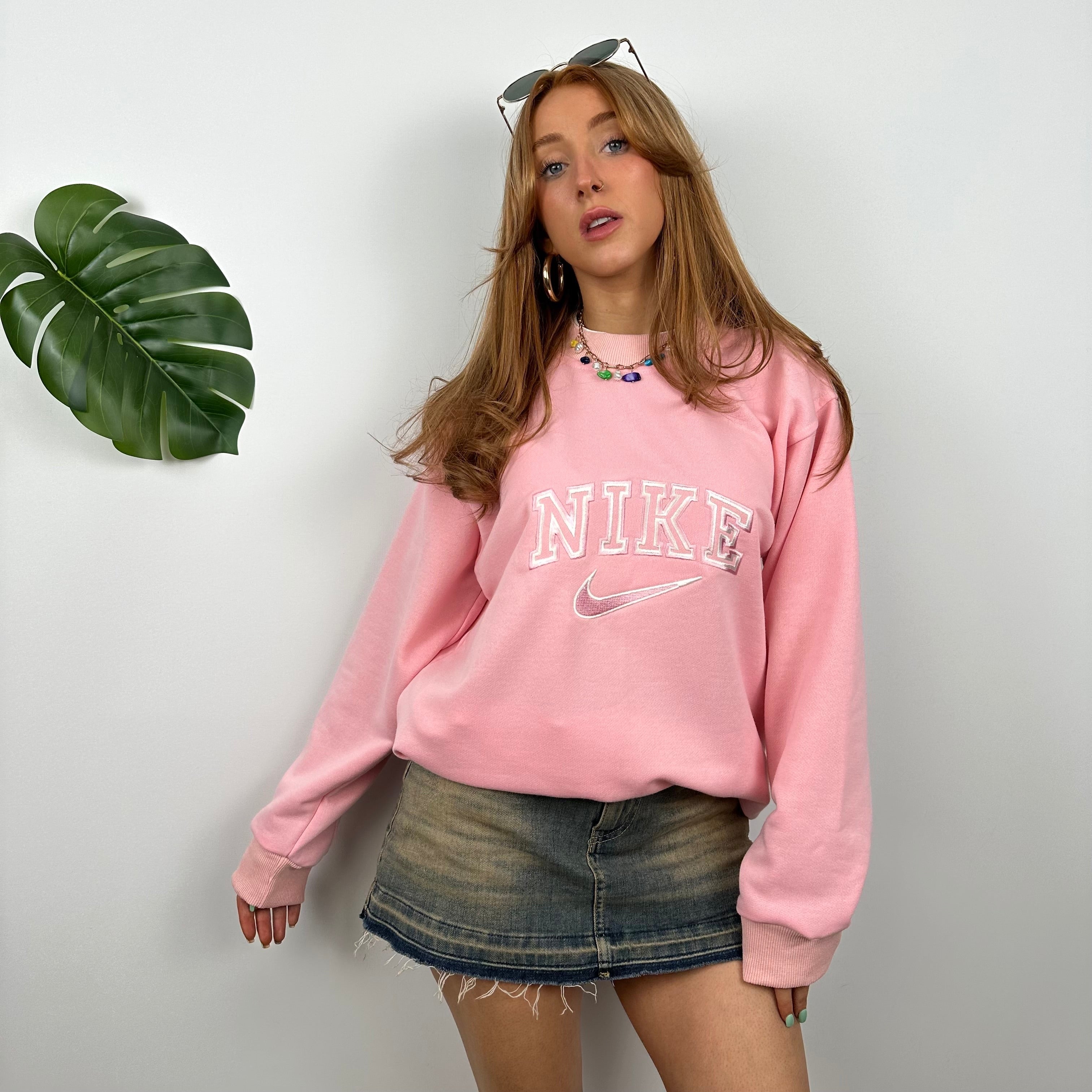 Nike Bubblegum Pink Embroidered Spell Out Sweatshirt as worn by Annalivia Hynds (L)