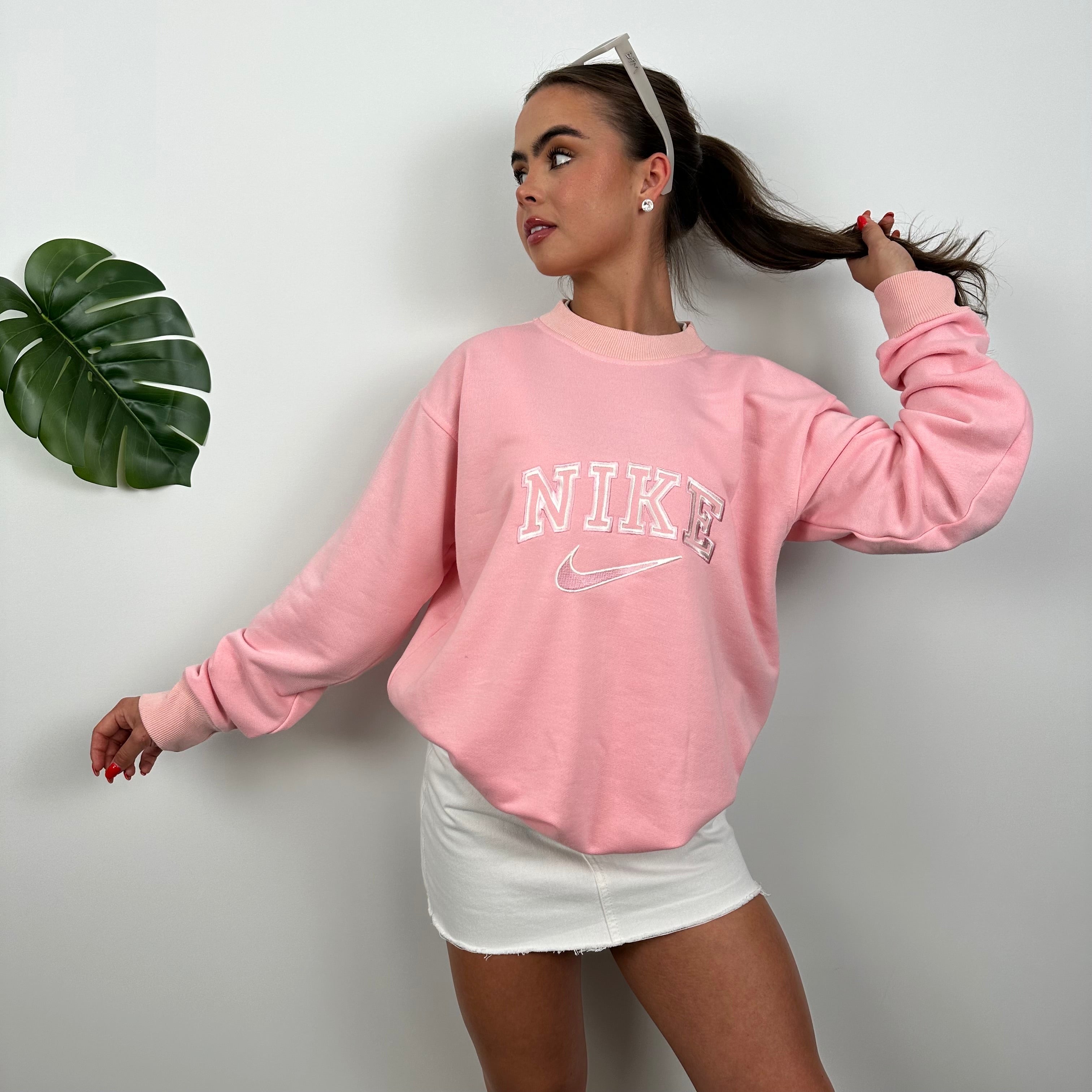 Nike Bubblegum Pink Embroidered Spell Out Sweatshirt as worn by Annalivia Hynds (L)