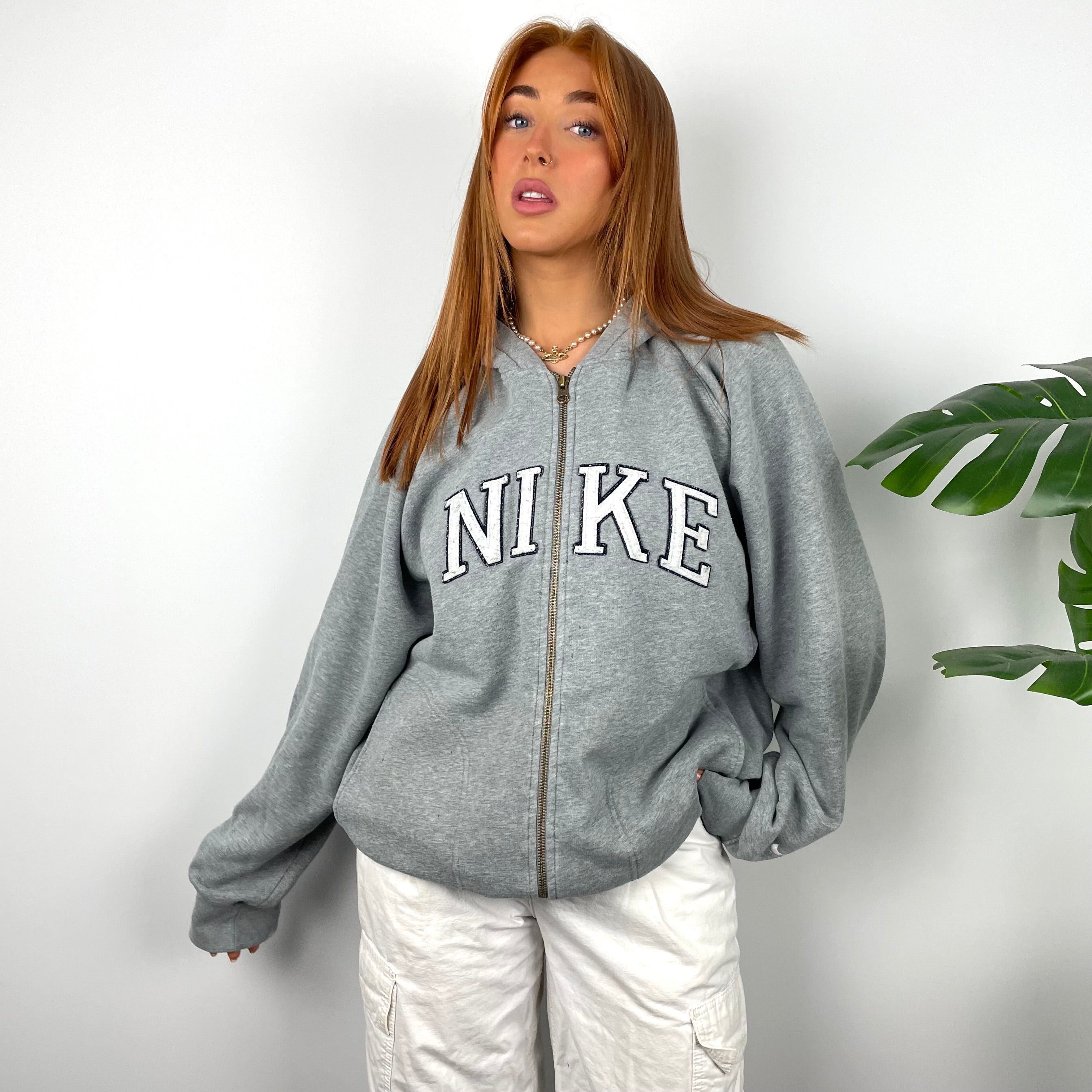 Nike Grey Embroidered Spell Out Zip Up Hoodie Jacket as worn by Annalivia Hynds (L)