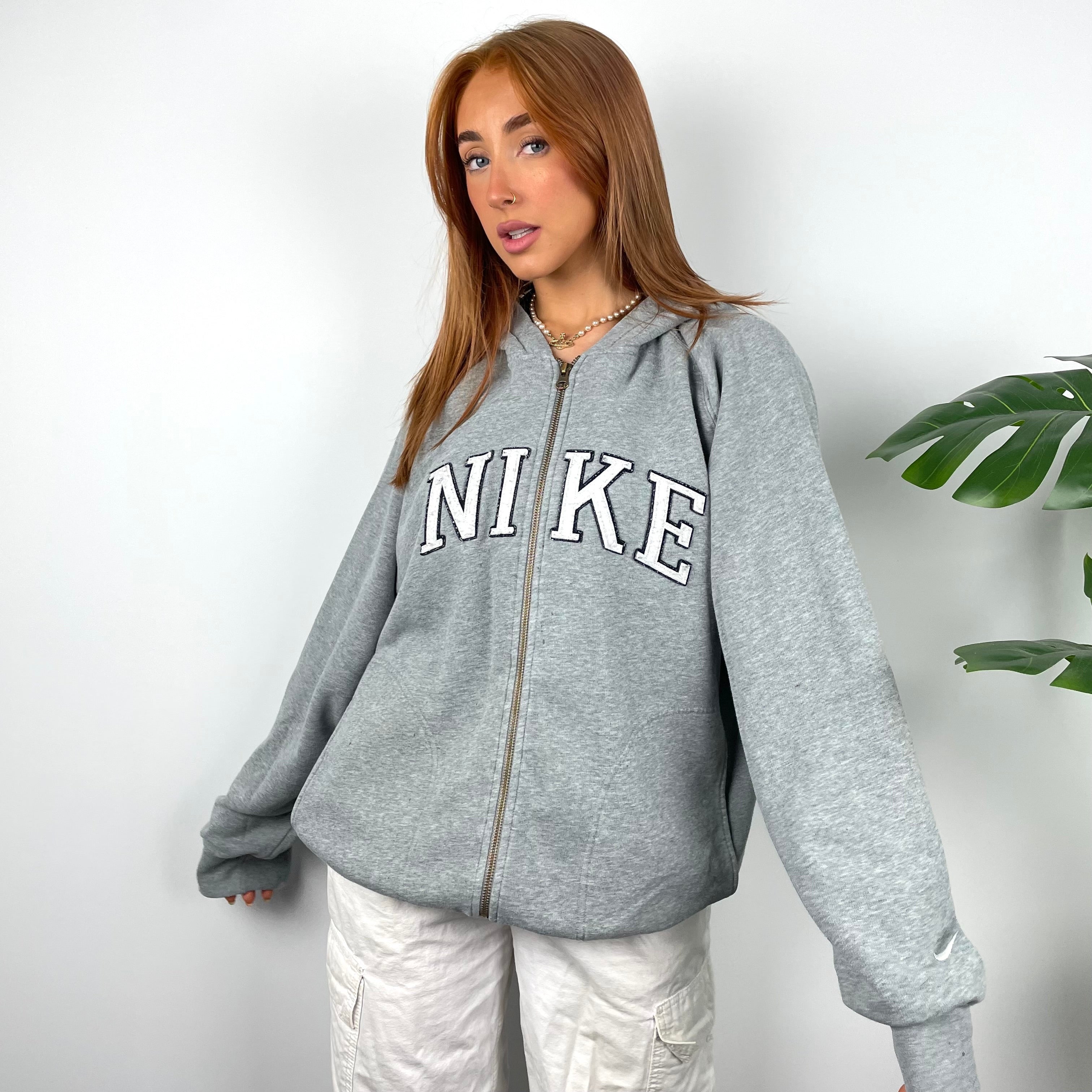 Nike Grey Embroidered Spell Out Zip Up Hoodie Jacket as worn by Annalivia Hynds (L)