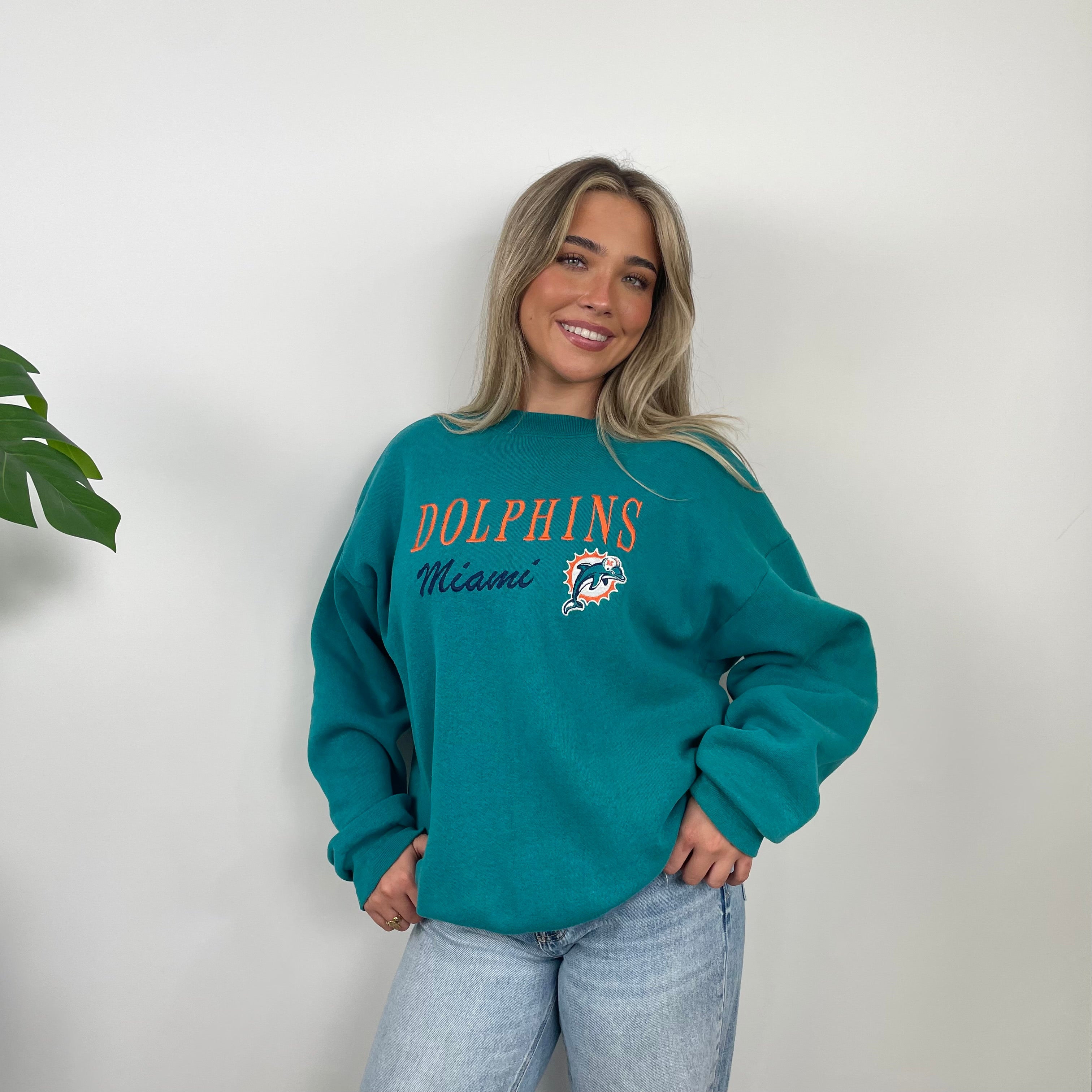 NFL Miami Dolphins Turquoise Embroidered Spell Out Sweatshirt (L)