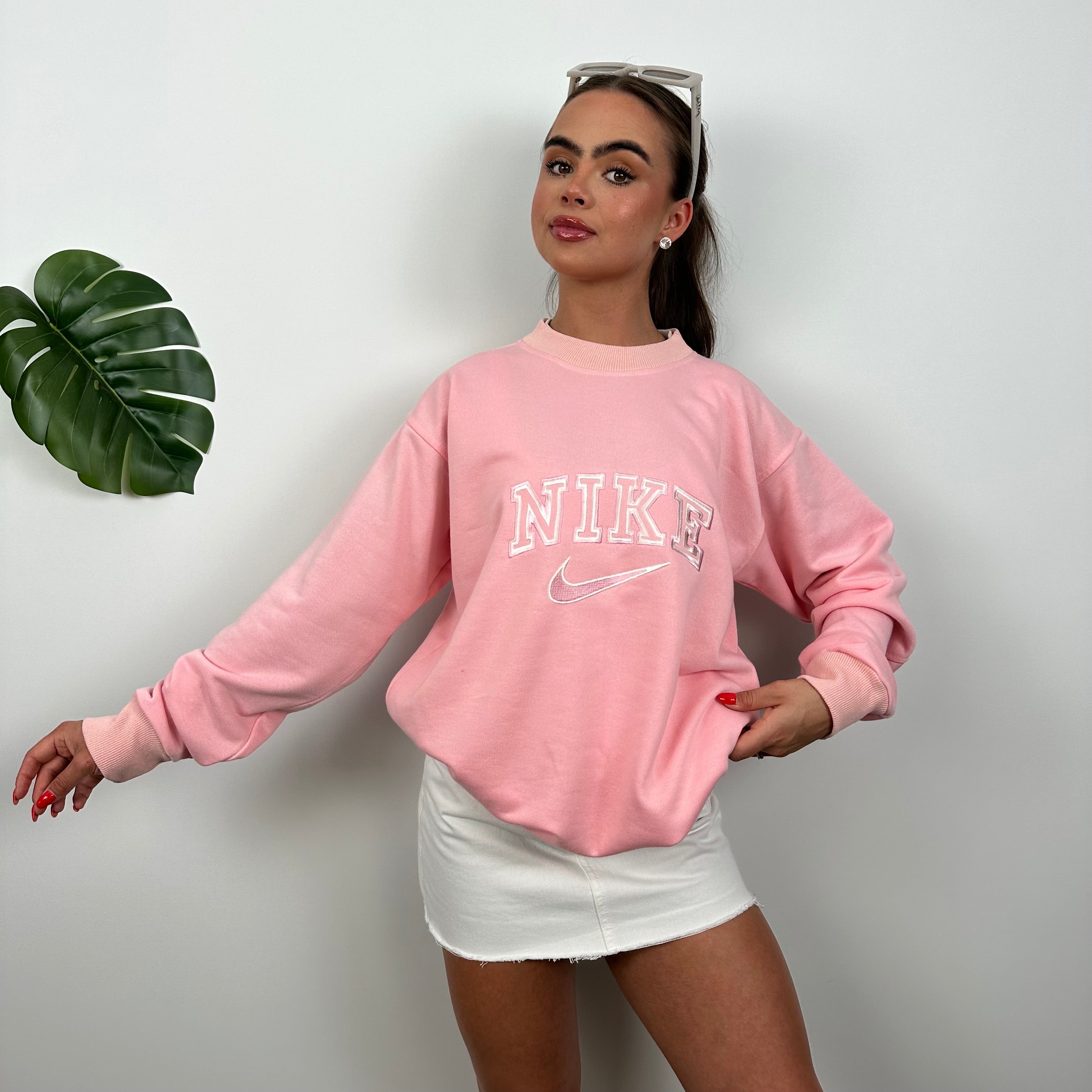 Nike Bubblegum Pink Embroidered Spell Out Sweatshirt as worn by Annalivia Hynds (L)